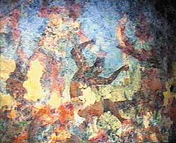 Фрагмент росписи в Храме фресок, изображающий момент захвата пленного (в центре) правителем Бонампака Йахав Чан Мувааном, одетым в шкуру ягуара (слева), и его военоначальником