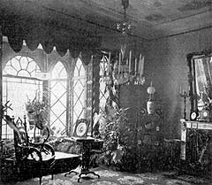 Будуар в 1870-х годах. Фарфоровый камин Миклашевского и малахитовые с бронзой часы